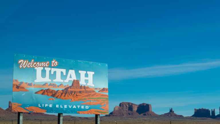 welcome to utah poster under blue daytime sky